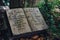 Book-shaped tombstone for wife and husband inside Hampstead Cemetery, London, UK