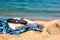 Book, sunglasses on a beach