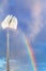 Book tied on cord soars into sky with rainbow