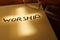 Book with word Worship