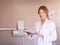 Book yourself a friendly appointment. Portrait of a female dentist using her tablet in her office.