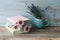 Books with bookmarks of fresh flowers, lavender bouquet on wooden table