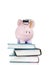 Books and graduation piggy bank