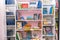 Books on the shelf. Blurred image of bookshelves. School class with books. Educational institution, library, bookstore