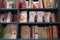 Bookshelf In Library With Many Parenting Books For Sale. Parenting, toddler guidebooks. Children Books. Toddler Books. What to