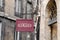 Bookshop sign on steel plate vintage signage of bookstore in city street in ancient european city