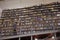 Bookstore - High Shelves with Books - Young Man