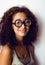 Bookworm, cute young woman in glasses, curly hair, teenage