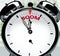 Boom soon, almost there, in short time - a clock symbolizes a reminder that Boom is near, will happen and finish quickly in a