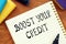 BOOST YOUR CREDIT question marks inscription on the sheet