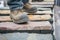 boots walking over rugged outdoor decking material samples