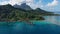Bora Bora aerial drone video of travel vacation paradise and overwater bungalows