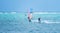 Boracay island, Philippines - January 25: windsurfers and kiteboarder enjoying wind power on Bulabog beach