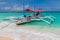 BORACAY, PHILIPPINES - FEBRUARY 2, 2018: Traditional paraw, double outrigger sail boat on Boracay island, Philippin