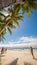 BORACAY, PHILIPPINES - JANUARY 7, 2018 - Tourists relaxing on the paradise shore of the White Beach in Boracay