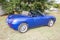 Bordeaux , Aquitaine / France - 04 26 2020 : Fiat Barchetta convertible blue car on green grass italian automobile
