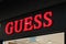 Bordeaux , Aquitaine / France - 09 23 2019 : Guess storefront red shop sign store luxury clothing American line brand