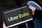 Bordeaux , Aquitaine / France - 12 04 2019 : Uber Eats sign logo tablet home application UberEats food delivery app