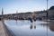 BORDEAUX, FRANCE - APRIL 14, 2019: The water mirror of the Bordeaux quays on a sunny spring day