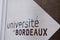 Bordeaux university sign text and logo brand panel in entrance in french city