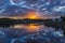 Border Crossing between Calais, Maine and St. Stephen, New Brunswick during summer sunset with orange skies