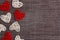 Border of decorative hearts on sackcloth background. Space for text. Valentine`s day concept