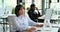 Bored Businesswoman Yawning at Her Office Desk