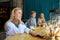 Bored caucasian woman sits alone at restaurant