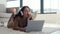 Bored Caucasian Woman Yawning While Using Laptop