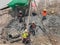 Bored piling workers are drilling mud hole with tripod rig and s