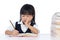 Boring Asian Chinese little girl wearing school uniform studying