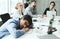 Boring presentation. Business man sleeping, lying on table