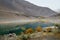 Borith lake against Karakoram mountain range.