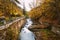 Borjomi, Georgia. Scenic View Of Autumn Borjomula Mountain River. Landscape With Long Exposure.