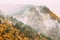 Borjomi, Samtskhe-Javakheti, Georgia. Pine Growing On Rocky Slope Of Mountains In Borjomi Nature Reserve. Clouds Fly Low