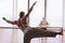 Born to dance. Rearview shot of a male dancer performing before a judge during an audition.