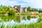 Borotin Castle ruins with romantic pond in the foreground, Borotin, South Bohemia, Czech Republic