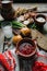 Borsch - beetroot soup in a clay bowl on a wooden background,traditional dish of ukrainian and russian cuisine.