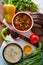 The borsch and mushroom soup served on table