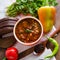 Borsch and mushroom soup served on table