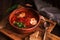 Borscht-beetroot soup. Traditional Russian Ukrainian food red soup with meat, sour cream, rye bread. Selective focus