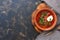 Borscht on a dark background top view. Russian or Ukrainian traditional soup. Copy space, flat lay.