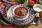 Borscht with sour cream. Beef, beetroot, cabbage and greens soup