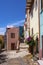 Bosa, Sardinia, Italy - Bosa historic old town quarter with colorful tenements and narrow street of Via Muruidda