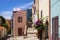 Bosa, Sardinia, Italy - Bosa historic old town quarter with colorful tenements and narrow street of Via Muruidda