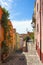 Bosa, Sardinia, Italy - Summer view of the Bosa old town quarter with historic colorful tenements and streets