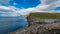 Bosdalafossur waterfall on Vagar island coastline wide timelapse, Faroe Islands