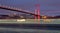 Bosporus Bridge at night with light trails of passing ships, Istanbul Turkey