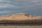 Bosque del Apache view of New Mexico mountain range before darkening skies