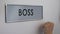 Boss office door, secretary hand knocking closeup, documents for signature